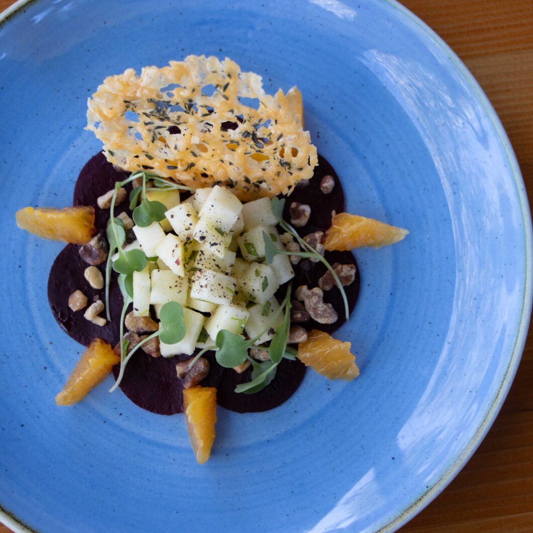 Beet Carpaccio with Apple, Orange Supremes, and Cheese Tuile