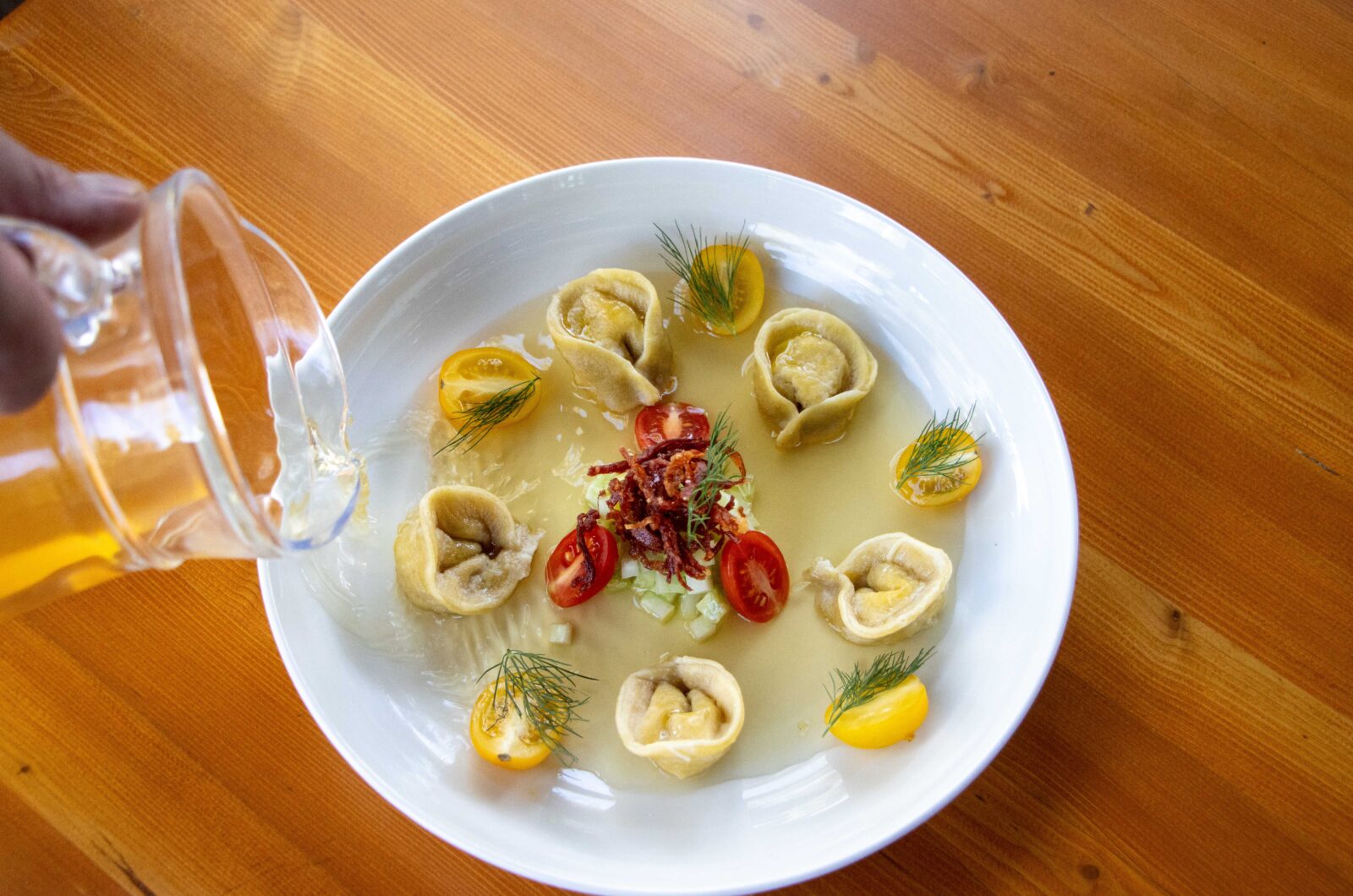 Lemon Ricotta Tortellini with Tomato Water, Cucumber, and Dill